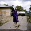Laurinda, a young Kamilaroi girl, plays with her dress as she waits for the bus that will take her to Sunday school. (Raphaela Rosella, Portraits, 1st prize singles)